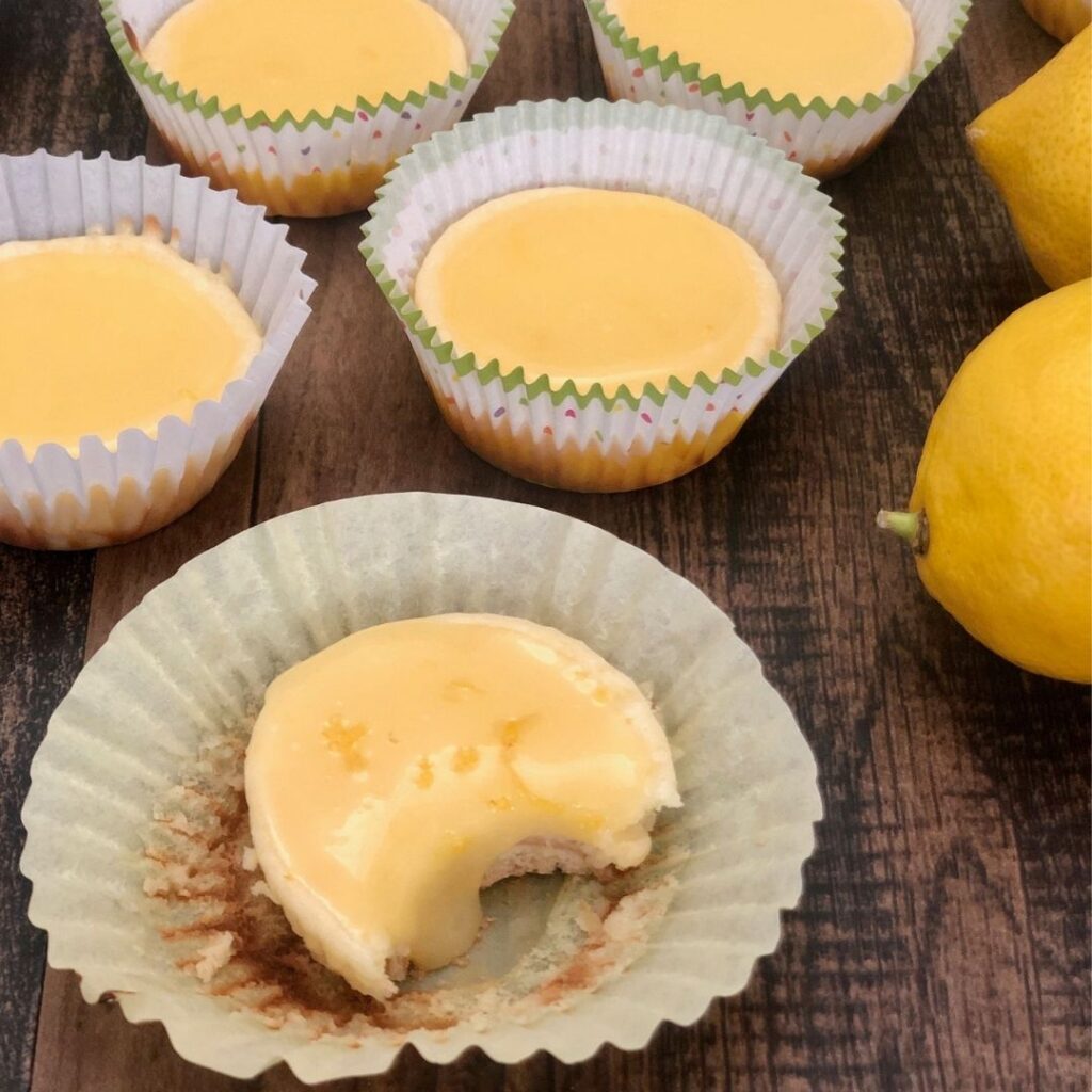 Mini Lemon Cheesecakes are perfectly sweet and lemony! Made with a creamy lemon-infused filling, these bite-sized treats are perfect for parties, gatherings, or a refreshing dessert anytime. Easy to make and full of citrusy flavor, they’re a hit with lemon lovers and cheesecake fans alike! #MiniLemonCheesecakes #EasyDesserts #LemonLovers #PartyTreats #BiteSizedDesserts #CheesecakeRecipe #HomemadeDesserts