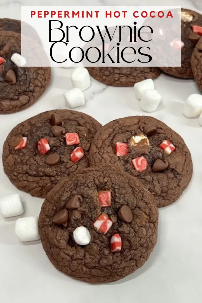 Peppermint Hot Cocoa Brownie Cookies are so cute and so yummy. They are quick to make and make a great holiday dessert. Serve with vanilla ice cream for a perfect dessert. #BrownieCookies #PeppermintHotCocoaCookies #EasyDessert #HolidayCookies #ChristmasCookies