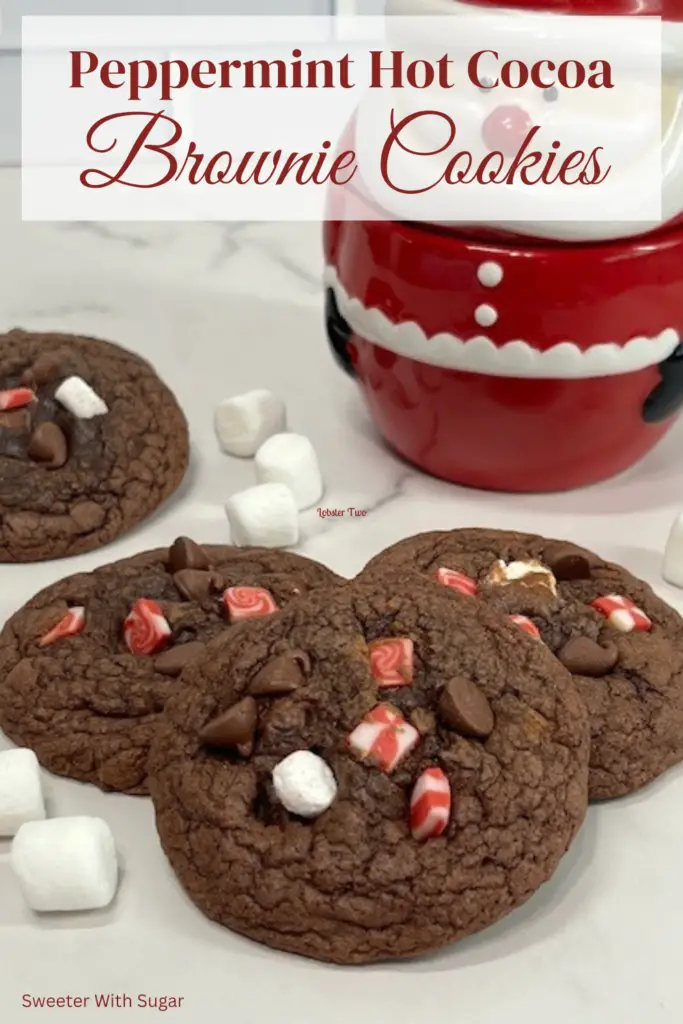 Peppermint Hot Cocoa Brownie Cookies are so cute and so yummy. They are quick to make and make a great holiday dessert. Serve with vanilla ice cream for a perfect dessert. #BrownieCookies #PeppermintHotCocoaCookies #EasyDessert #HolidayCookies #ChristmasCookies