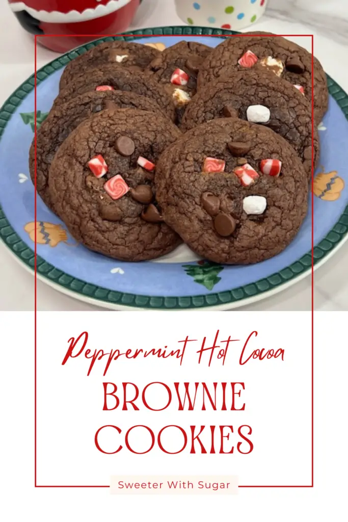 Peppermint Hot Cocoa Brownie Cookies are so cute and so yummy. They are quick to make and make a great holiday dessert. Serve with vanilla ice cream for a perfect dessert. #BrownieCookies #PeppermintHotCocoaCookies #EasyDessert #HolidayCookies #ChristmasCookies