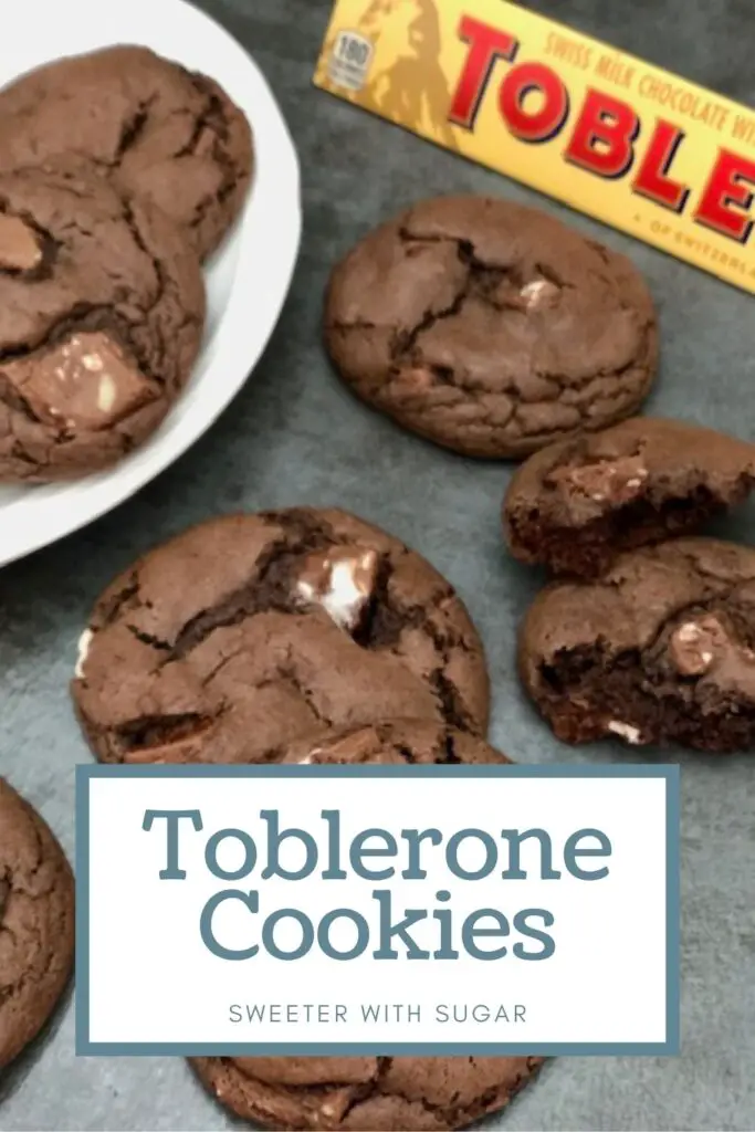 Toblerone Cookies are super simple to make and they taste fantastic with pieces of Toblerone candy bars mixed in. #Toblerone #TobleroneCookies #CandyBarCookies #CakeMixCookies #ChocolateCookies