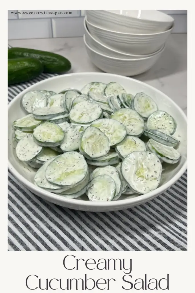 This Creamy Cucumber Salad recipe is quick to make and delicious! Crisp cucumbers are tossed in a tangy and creamy dressing made with sour cream, mayonnaise, dill, and a hint of lemon. Perfect as a light side dish for summer barbecues, picnics, or everyday meals, this salad is quick to prepare and bursting with fresh flavor. #CreamyCucumberSalad #SummerRecipes #FreshSalads #EasySideDishes #HealthyEating #BBQSide #PicnicFood