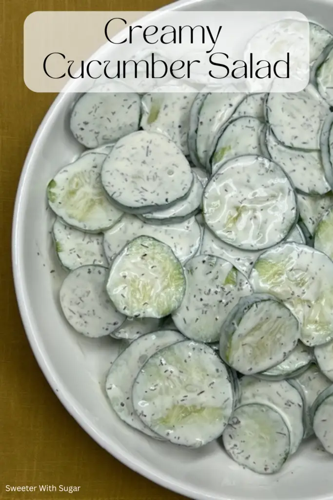 This Creamy Cucumber Salad recipe is quick to make and delicious! Crisp cucumbers are tossed in a tangy and creamy dressing made with sour cream, mayonnaise, dill, and a hint of lemon. Perfect as a light side dish for summer barbecues, picnics, or everyday meals, this salad is quick to prepare and bursting with fresh flavor. #CreamyCucumberSalad #SummerRecipes #FreshSalads #EasySideDishes #HealthyEating #BBQSide #PicnicFood